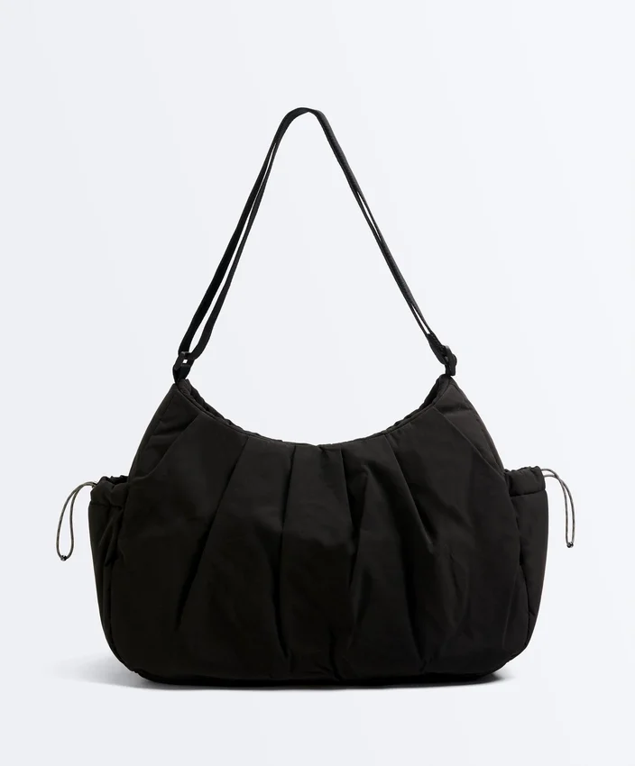 Bolsas de compras com bolsos laterais Bolsas de compras com bolsos laterais