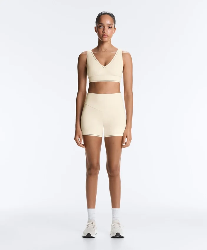 Sutiã desportivo Comfortlux de suporte médio com bainha em ponto de alinhavo Sutiã desportivo Comfortlux de suporte médio com bainha em ponto de alinhavo
