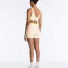 Sutiã desportivo Comfortlux de suporte médio com bainha em ponto de alinhavo Sutiã desportivo Comfortlux de suporte médio com bainha em ponto de alinhavo