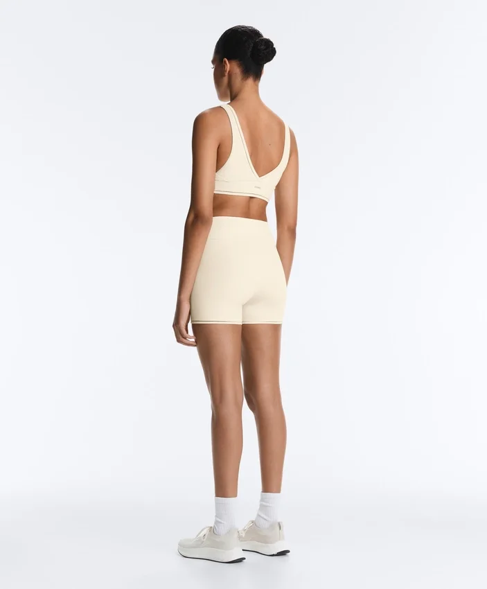 Sutiã desportivo Comfortlux de suporte médio com bainha em ponto de alinhavo Sutiã desportivo Comfortlux de suporte médio com bainha em ponto de alinhavo