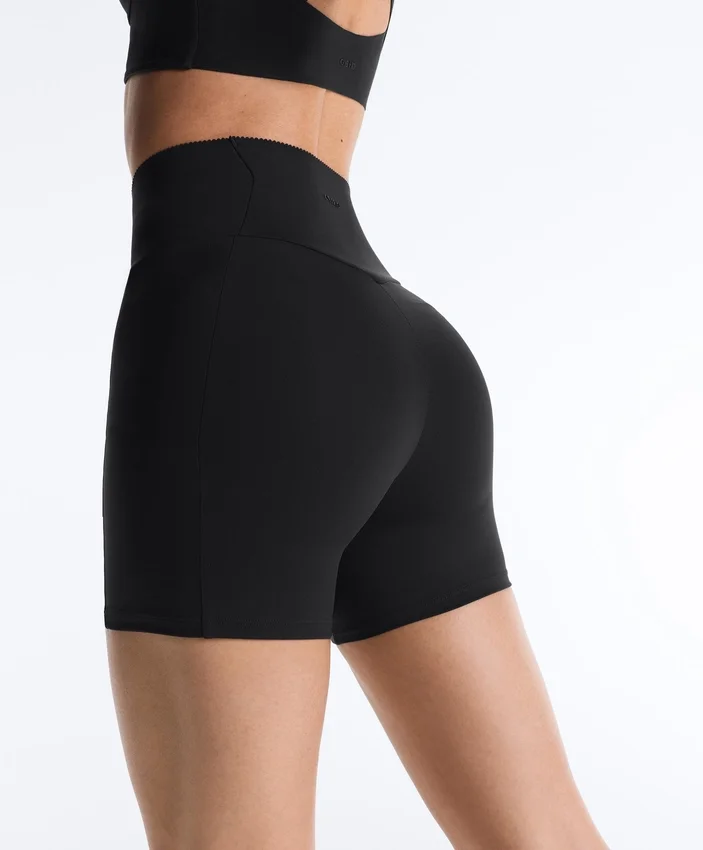 Calças de 10 cm com cintura alta e bolso compressivo Calças de 10 cm com cintura alta e bolso compressivo