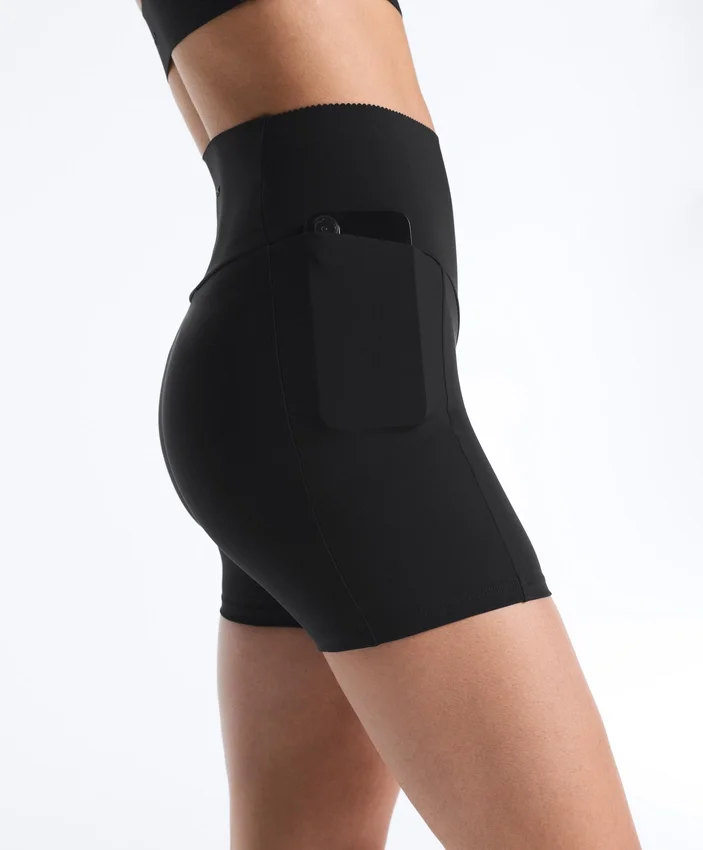 Calças de 10 cm com cintura alta e bolso compressivo Calças de 10 cm com cintura alta e bolso compressivo