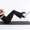 Calças de cintura alta, compressivas e com corte largo Calças de cintura alta, compressivas e com corte largo