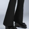 Calças de esqui elásticas, de cintura alta e corte largo, resistentes à água Calças de esqui elásticas, de cintura alta e corte largo, resistentes à água