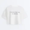 Camisas curtas e largas em mistura de algodão com slogan Camisas curtas e largas em mistura de algodão com slogan