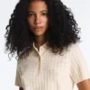 Camisas polo de malha com aberturas e manga curta