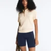Camisas polo de malha com aberturas e manga curta