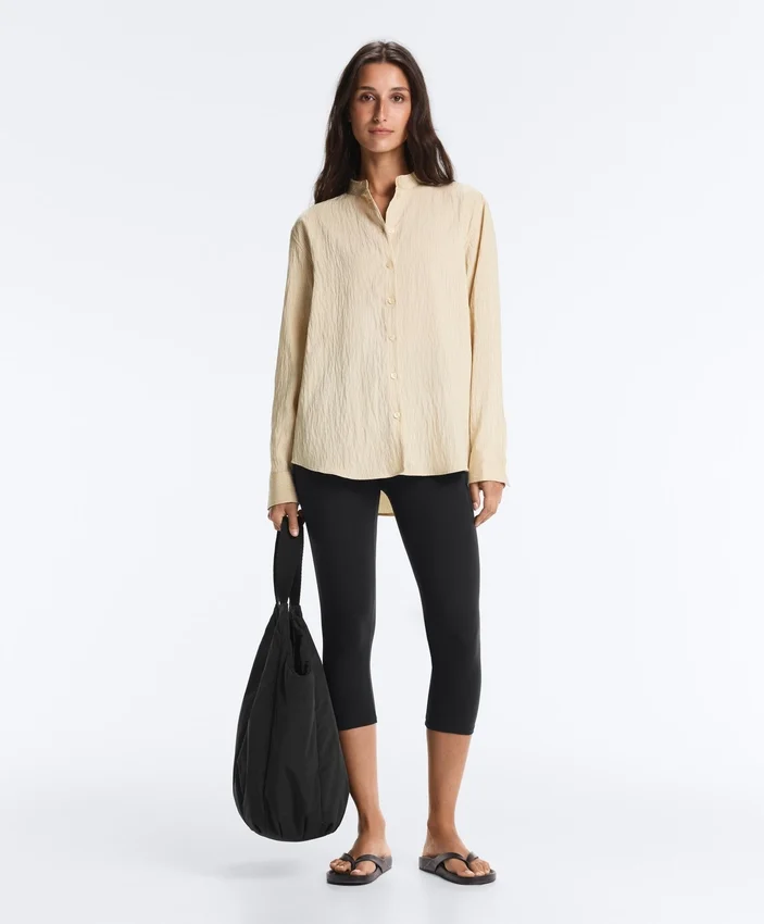 Camisas às riscas com gola alta em mistura de modal Camisas às riscas com gola alta em mistura de modal