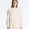 Camisola com decote em V em malha trançada 100% algodão Camisola com decote em V em malha trançada 100% algodão