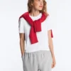 Camisola com decote em V em malha trançada 100% algodão Camisola com decote em V em malha trançada 100% algodão