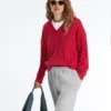Camisola com decote em V em malha trançada 100% algodão Camisola com decote em V em malha trançada 100% algodão