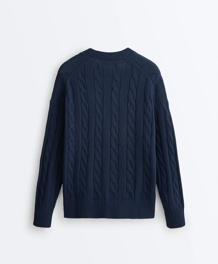 Camisola com decote em V em malha trançada 100% algodão Camisola com decote em V em malha trançada 100% algodão