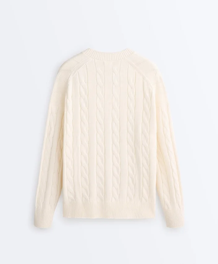 Camisola com decote em V em malha trançada 100% algodão Camisola com decote em V em malha trançada 100% algodão