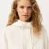 Camisola com meio fecho e bolso frontal, mistura de lyocell e 24% de linho Camisola com meio fecho e bolso frontal, mistura de lyocell e 24% de linho