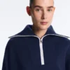 Camisola de gola alta com meio fecho Camisola de gola alta com meio fecho