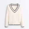 Camisola de malha com decote em V contrastante Camisola de malha com decote em V contrastante