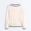 Camisola de malha com decote em V contrastante Camisola de malha com decote em V contrastante