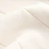 Camisola de malha com decote em V contrastante Camisola de malha com decote em V contrastante