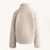 Camisola em imitação de casacos de pelo de carneiro com bolso frontal