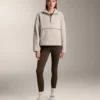 Camisola em imitação de casacos de pelo de carneiro com bolso frontal
