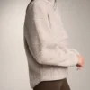 Camisola em imitação de casacos de pelo de carneiro com bolso frontal