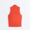 Camisola sem mangas com meio fecho Camisola sem mangas com meio fecho