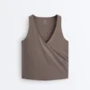 Camisola sem mangas Comfortlux com decote cruzado Camisola sem mangas Comfortlux com decote cruzado