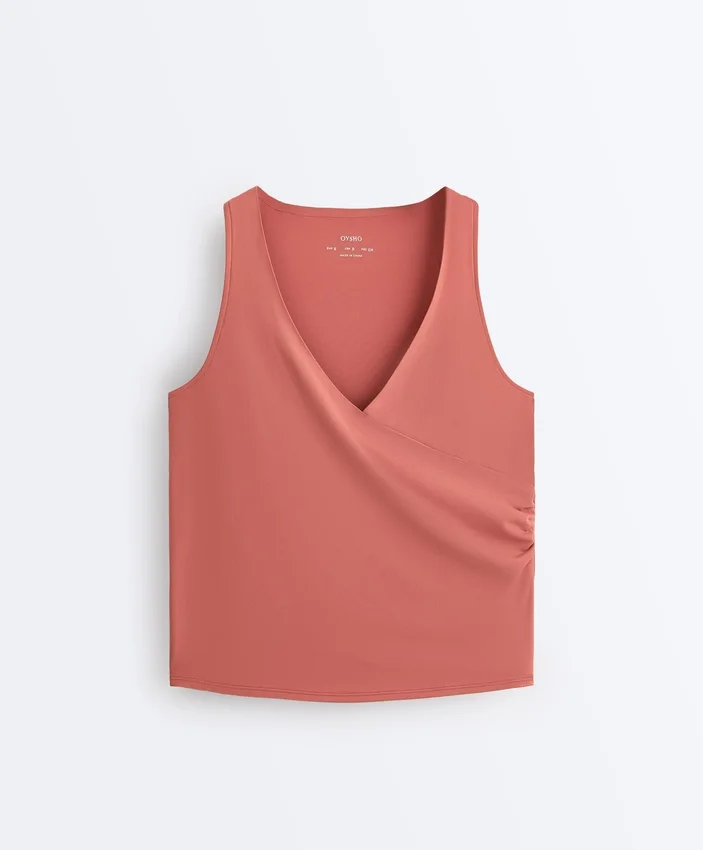 Camisola sem mangas Comfortlux com decote cruzado Camisola sem mangas Comfortlux com decote cruzado