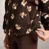 Casaco com estampado floral em imitação de casacos de pelo de carneiro