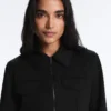 Casaco com peplum com efeito neoprene e canelado Casaco com peplum com efeito neoprene e canelado