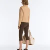 Casaco com peplum com efeito neoprene e canelado Casaco com peplum com efeito neoprene e canelado