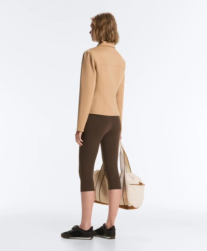 Casaco com peplum com efeito neoprene e canelado Casaco com peplum com efeito neoprene e canelado