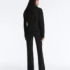 Casaco com peplum com efeito neoprene e canelado Casaco com peplum com efeito neoprene e canelado
