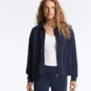 Casaco em modal Soft Touch com cintura ajustável e gola alta Casaco em modal Soft Touch com cintura ajustável e gola alta