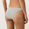 Cueca de biquínis com corte em U e cobertura média em jacquard às bolinhas Cueca de biquínis com corte em U e cobertura média em jacquard às bolinhas