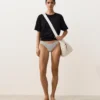 Cueca de biquínis com corte em U e cobertura média em jacquard às bolinhas Cueca de biquínis com corte em U e cobertura média em jacquard às bolinhas