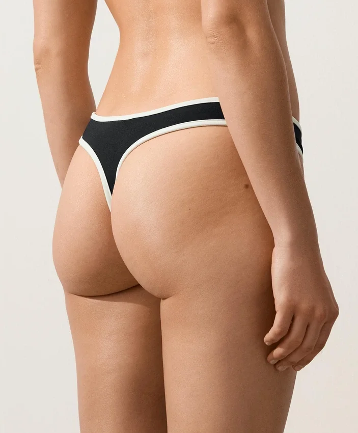 Cueca de fio dental com corte em U e acabamento contrastante Cueca de fio dental com corte em U e acabamento contrastante