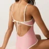 Fato de banho bandeau com acabamentos contrastantes Fato de banho bandeau com acabamentos contrastantes