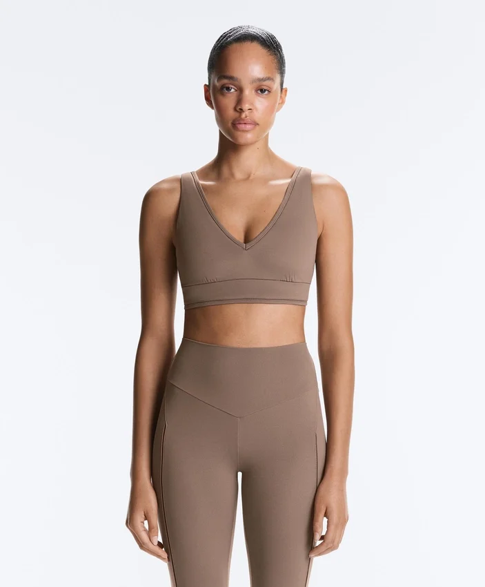 Sutiã desportivo Comfortlux de suporte médio com bainha em ponto de alinhavo Sutiã desportivo Comfortlux de suporte médio com bainha em ponto de alinhavo
