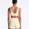 Sutiã desportivo Comfortlux de suporte médio com bainha em ponto de alinhavo Sutiã desportivo Comfortlux de suporte médio com bainha em ponto de alinhavo