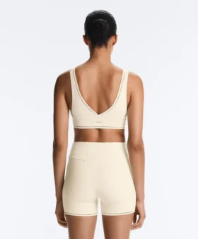 Sutiã desportivo Comfortlux de suporte médio com bainha em ponto de alinhavo