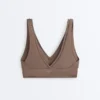 Sutiã desportivo Comfortlux de suporte médio com bainha em ponto de alinhavo Sutiã desportivo Comfortlux de suporte médio com bainha em ponto de alinhavo