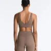 Sutiã desportivo Comfortlux de suporte médio com bainha em ponto de alinhavo Sutiã desportivo Comfortlux de suporte médio com bainha em ponto de alinhavo
