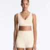 Sutiã desportivo Comfortlux de suporte médio com bainha em ponto de alinhavo Sutiã desportivo Comfortlux de suporte médio com bainha em ponto de alinhavo