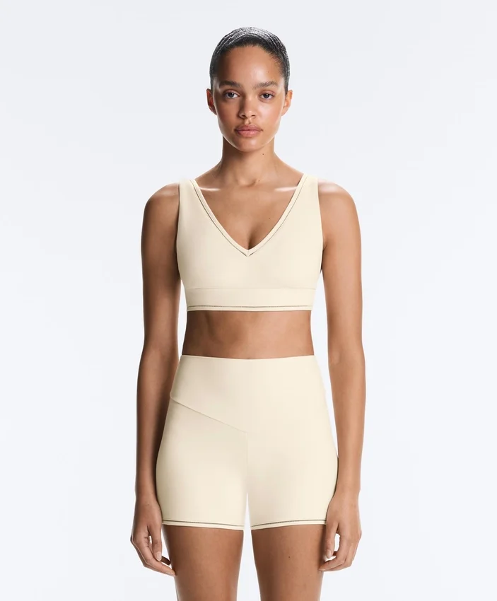 Sutiã desportivo Comfortlux de suporte médio com bainha em ponto de alinhavo Sutiã desportivo Comfortlux de suporte médio com bainha em ponto de alinhavo