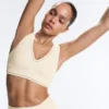 Sutiã desportivo Comfortlux de suporte médio com bainha em ponto de alinhavo Sutiã desportivo Comfortlux de suporte médio com bainha em ponto de alinhavo