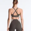 Sutiã desportivo compressivo de apoio firme com detalhes refletores Sutiã desportivo compressivo de apoio firme com detalhes refletores
