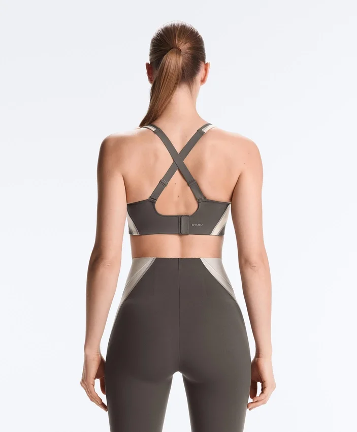Sutiã desportivo compressivo de apoio firme com detalhes refletores Sutiã desportivo compressivo de apoio firme com detalhes refletores