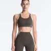 Sutiã desportivo compressivo de apoio firme com detalhes refletores Sutiã desportivo compressivo de apoio firme com detalhes refletores