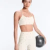 Sutiã desportivo Evermove de apoio leve com estampado floral Sutiã desportivo Evermove de apoio leve com estampado floral